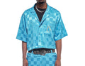 Chemise en Bazin couleur bleu écriture beige
